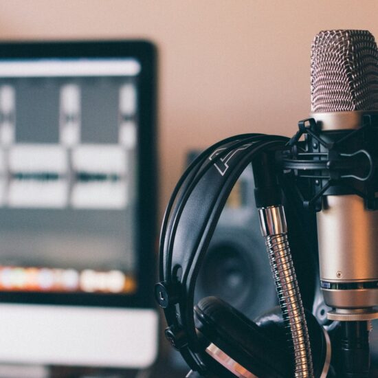 black and silver headphones on black and silver microphone