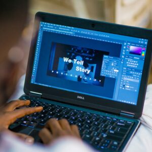 person using black laptop computer